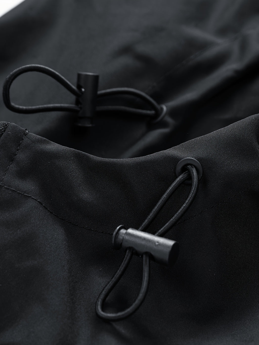 Black Water-Resistant Star-Print Oversized Hooded Windbreaker