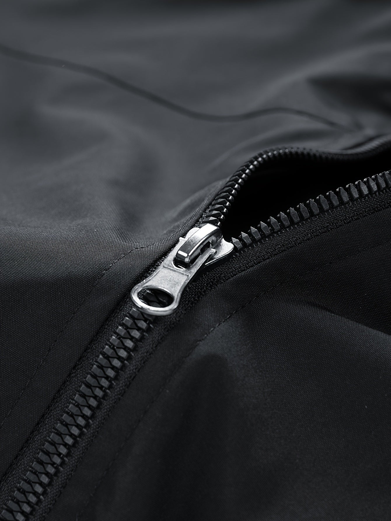 Black Water-Resistant Star-Print Oversized Hooded Windbreaker